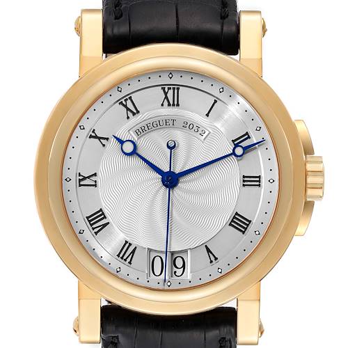The Breguet Marine 5817BA/12/9V8 Men's Yellow Gold Silver Dial 5817BA/12/9V8 Men's Yellow Gold Silver Dial watch is shown from a front angle, displaying its dial, hands, and part of the strap.