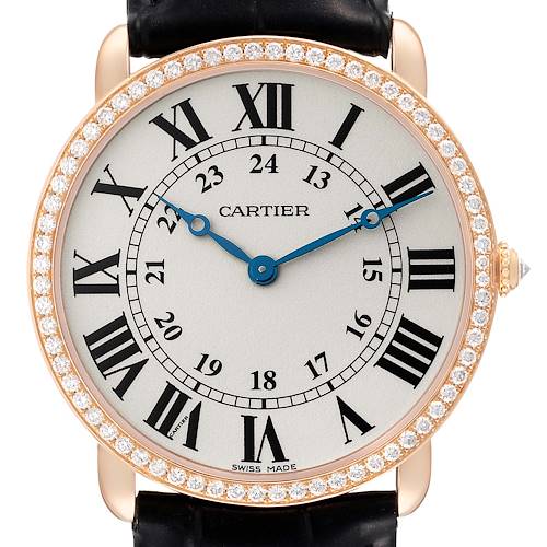 The Cartier Tank Louis WR000651 Women's Rose Gold Silver Dial watch face is shown from the front, highlighting its Roman numerals, diamond bezel, and blue hands.