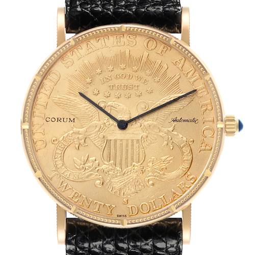 The Corum Coin Watch Men's Yellow Gold Champagne Dial Men's Yellow Gold Champagne Dial model is shown from a front angle, displaying its intricate coin dial and a portion of the leather strap.