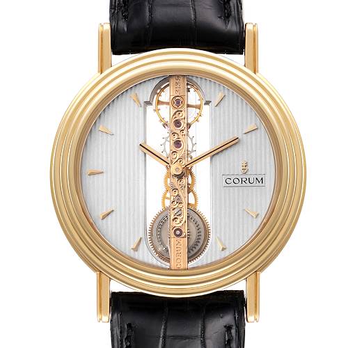 This is a front view of the Corum Golden Bridge 13.240.58 Men's Yellow Gold Silver Dial 13.240.58 Men's Yellow Gold Silver Dial watch showing its intricate inner mechanisms and gold detailing.