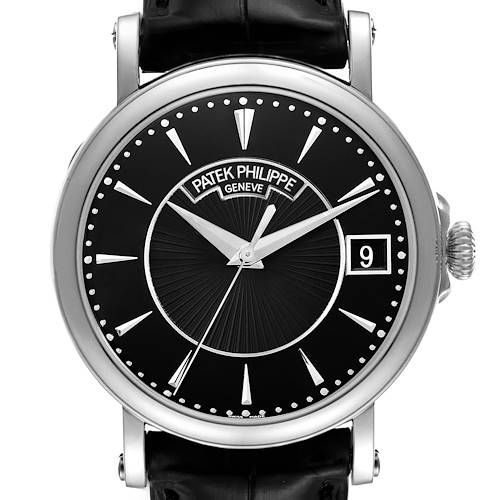 The image shows a front view of the Patek Philippe Calatrava 5153G Men's White Gold Black Dial watch, highlighting the dial, hands, crown, and strap.
