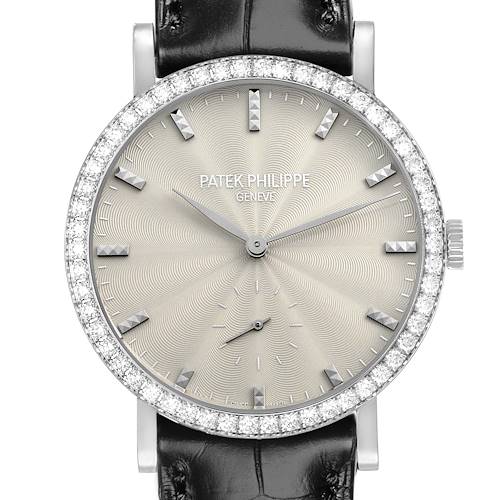 The Patek Philippe Calatrava 7120G-001 Women's White Gold Beige Dial watch is shown from the front, highlighting the dial, diamond bezel, and leather strap.