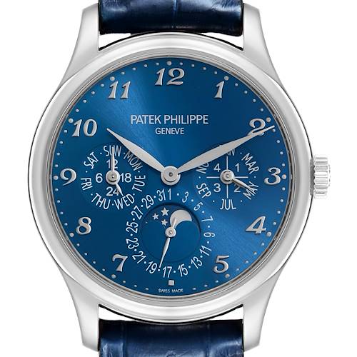 The Patek Philippe Complications 5327G-001 Men's White Gold Blue Dial watch is shown from a front angle, highlighting its blue dial, numerals, subdials, and a moon phase.