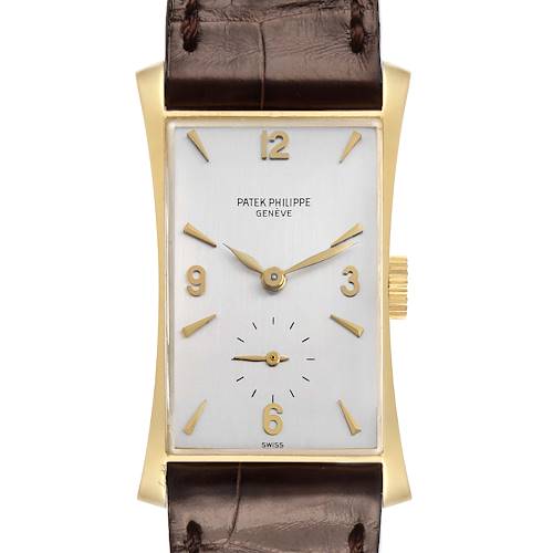 The Patek Philippe Vintage 1593 Men's Yellow Gold Silver Dial model is shown from a front angle, highlighting its rectangular dial, gold case, and brown leather strap.