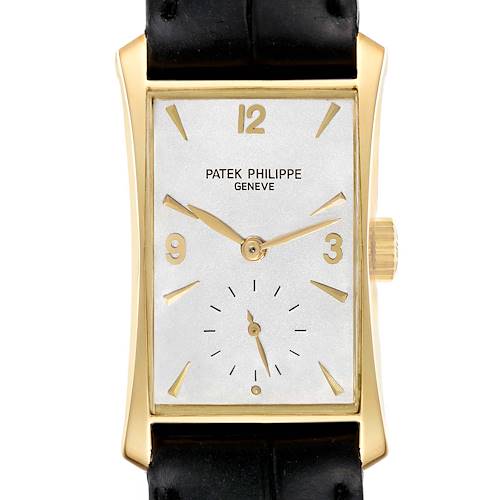The vintage Patek Philippe watch is shown from the front, displaying the dial, hands, case, crown, and part of the strap.
