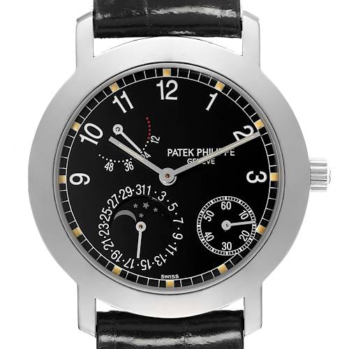 The image shows the face of a Patek Philippe Complications 5055G-010 Men's White Gold Black Dial 5055G-010 Men's White Gold Black Dial watch from a front angle, highlighting its black dial and multiple subdials.