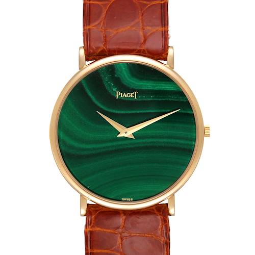 The Yellow Gold Malachite Stone Dial Vintage Mens Watch 9035 by Piaget 9035 Men's Yellow Gold Green Dial 9035 Men's Yellow Gold Green Dial is shown from the front, highlighting the dial and a portion of the strap.