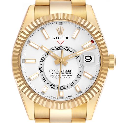 The Rolex Sky-Dweller 326938 Men's Yellow Gold White Dial 326938 Men's Yellow Gold White Dial is shown from the front, highlighting the dial, fluted bezel, and date window.