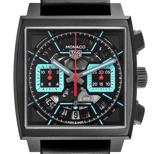 The Tag Heuer Monaco CBL2184.FT6236 Men's Titanium Transparent Dial watch is shown from a front angle, featuring its square case, subdials, and exposed mechanics.